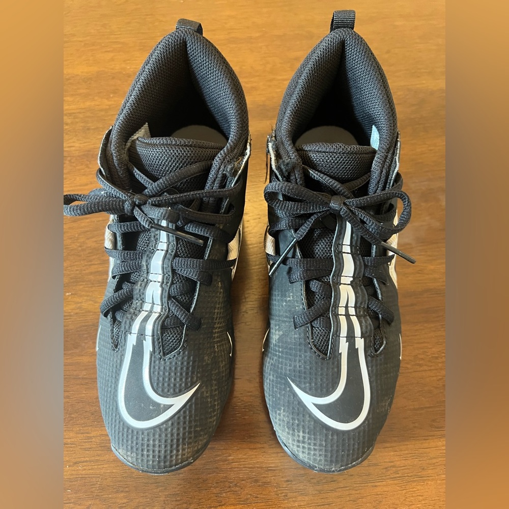Nike alpha cleats boys size 5Y.